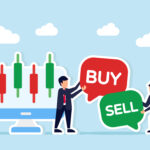 Two businessmen next to a monitor showing candlestick stock char