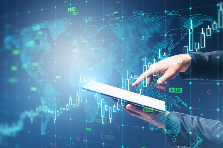 Close up of businessman hand pointing at cellphone with growing upward chart, map, arrows and forex graph on blurry background. Global trends, trading and finance concept. Double exposure.